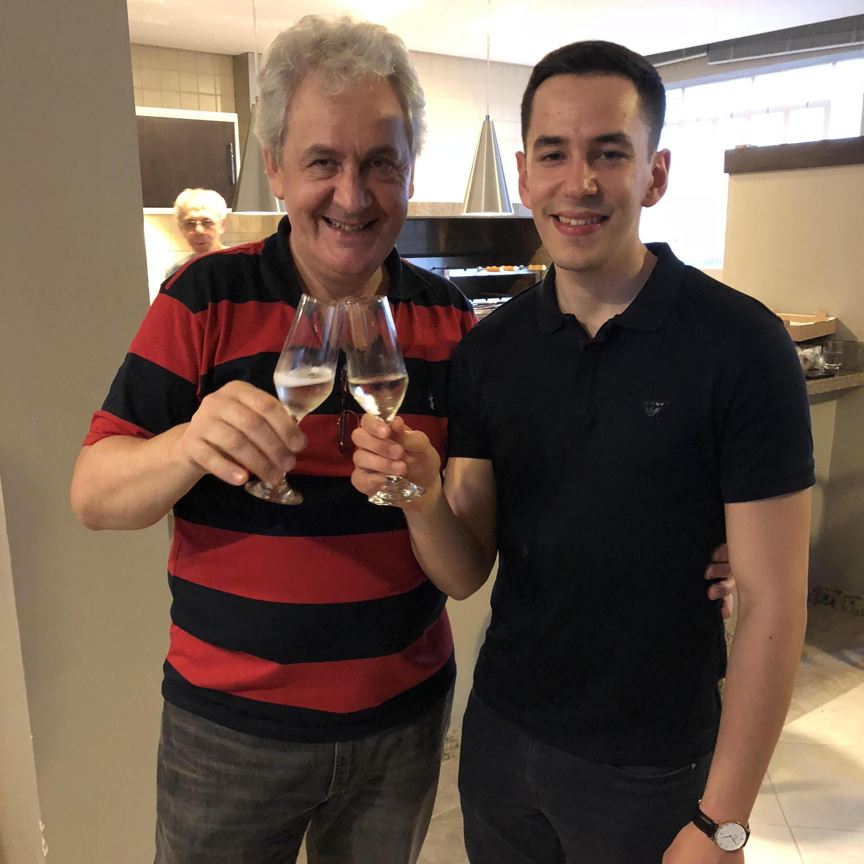 Pablo and his papà Tarcisio, celebrating a birthday in Brazil