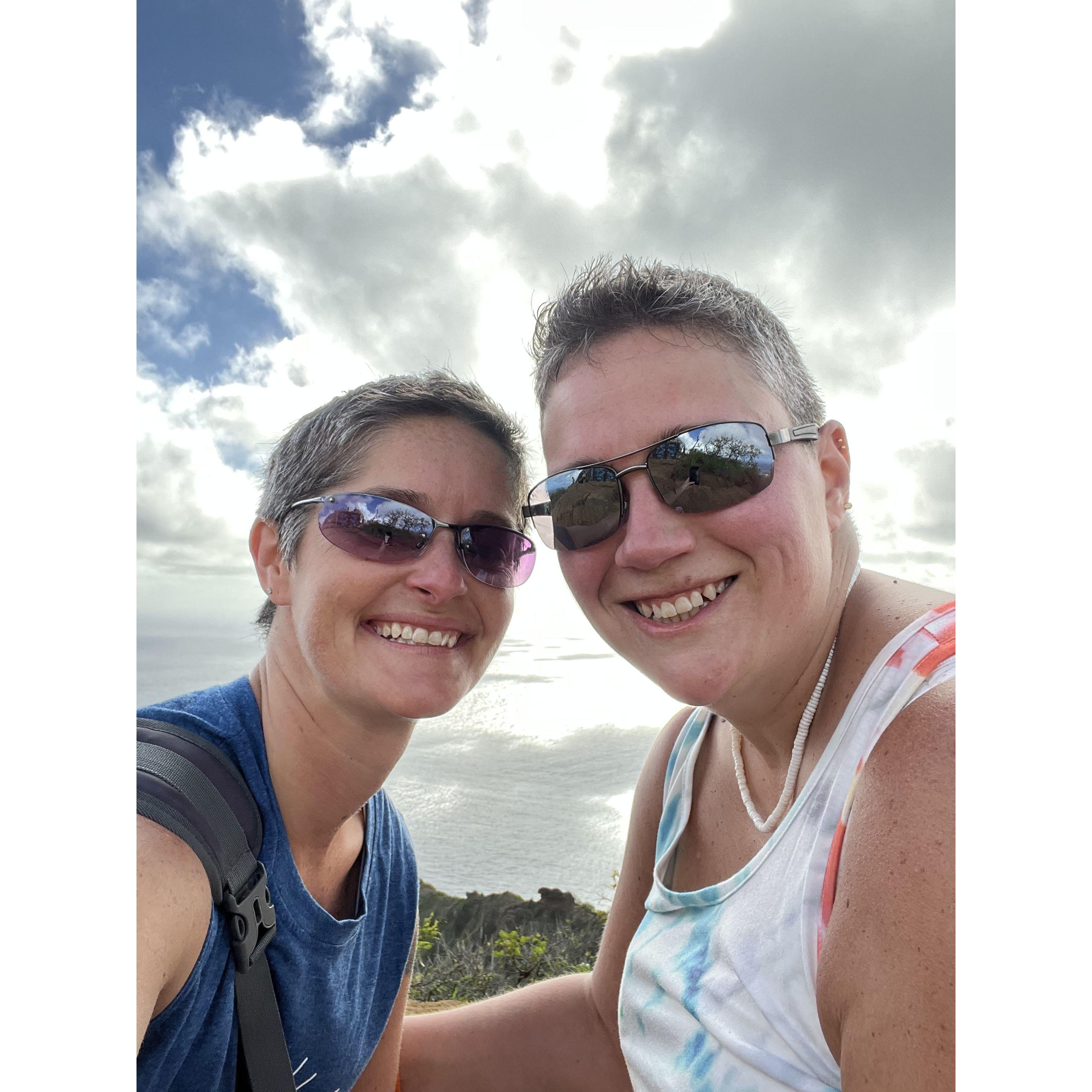 The picture was taken at the top of Koko Head in Hawaii after Andrea said yes!