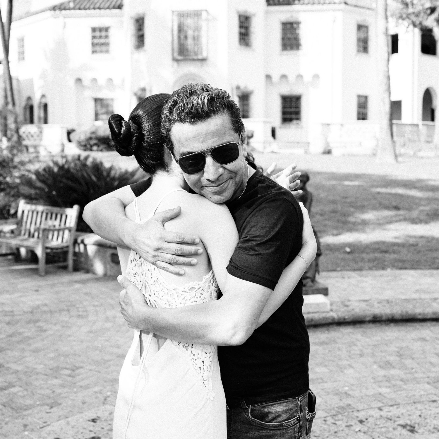 Big hugs from pops moments after the proposal. His sunglasses probably hiding some tears of joy.
