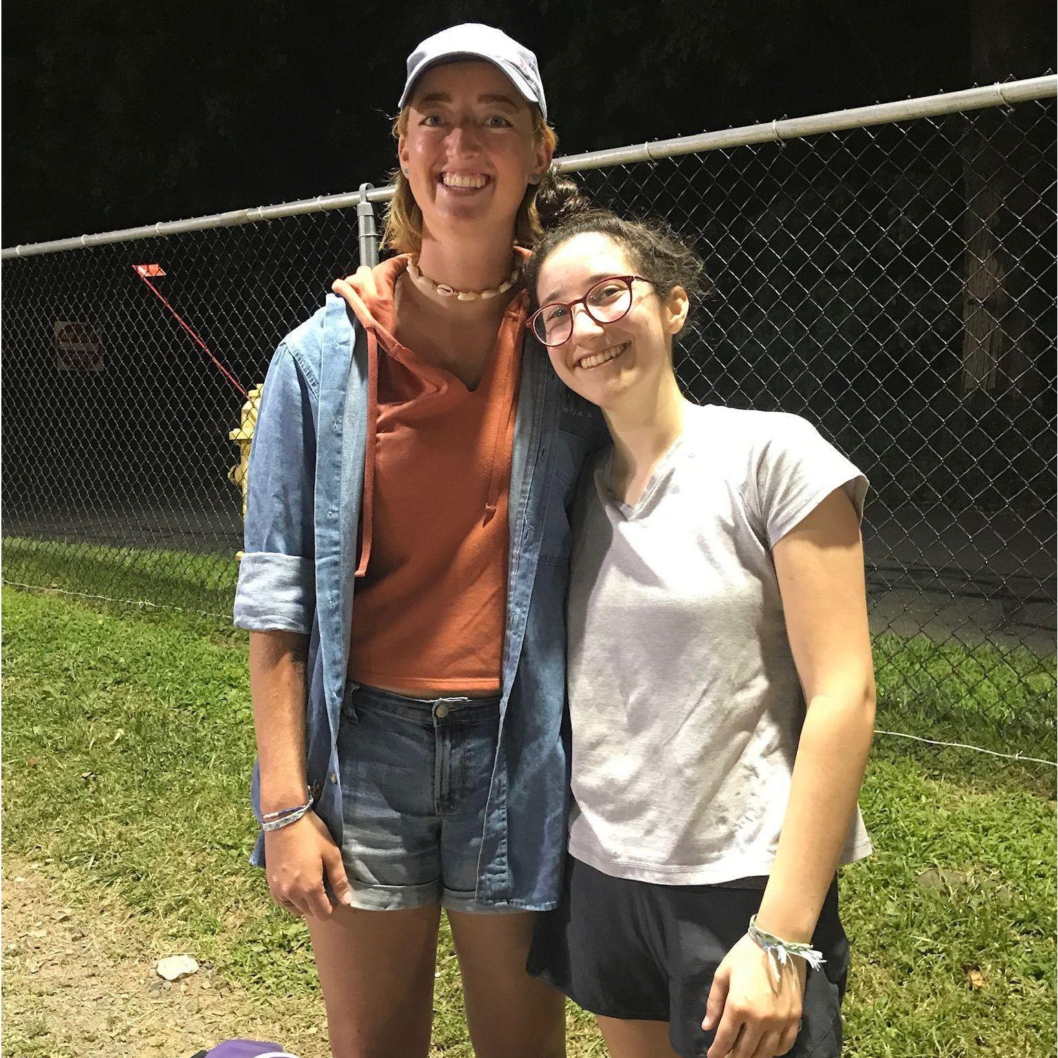 Gracie being the #1 Fan for Jess's summer softball team the first year they were together. She was such a big fan she got to play in one of the games when they were short on players.