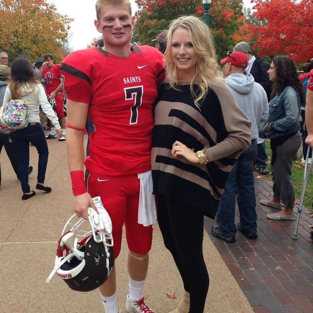 Madison pretending to watch a football game, but in reality went home to get her hair done to get a post-game picture with Ev.
