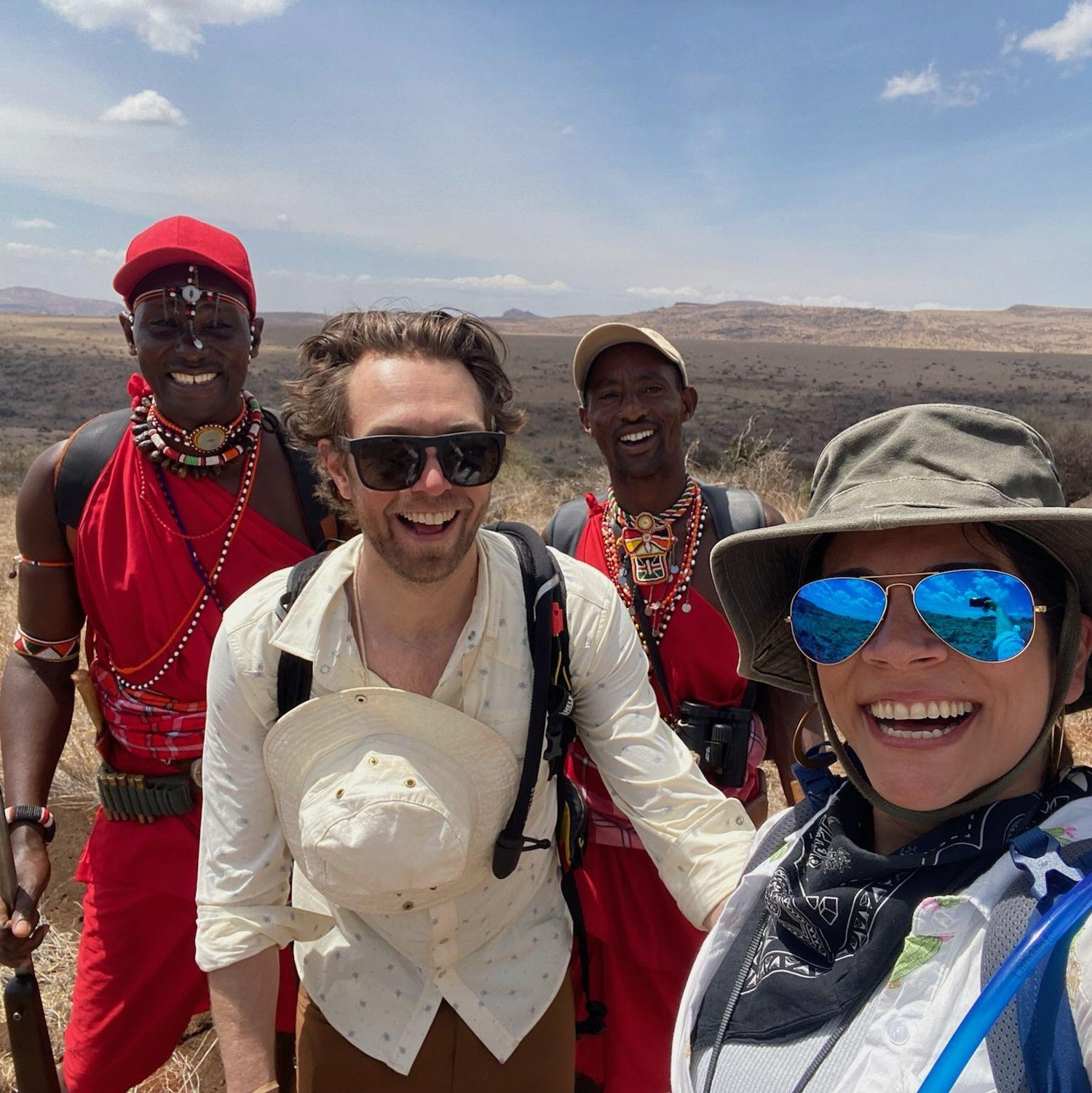This is what it looks like to track lions on foot for 2 hours, be afraid for your lives towards the end, then celebrate with your guides when you get within 10 feet of two males!