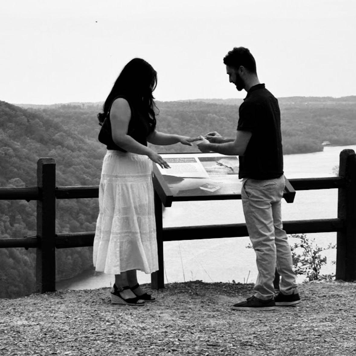 😂 In this photo, I basically told Arman, “Make it fit!”—even if he had to shove the ring onto my finger.