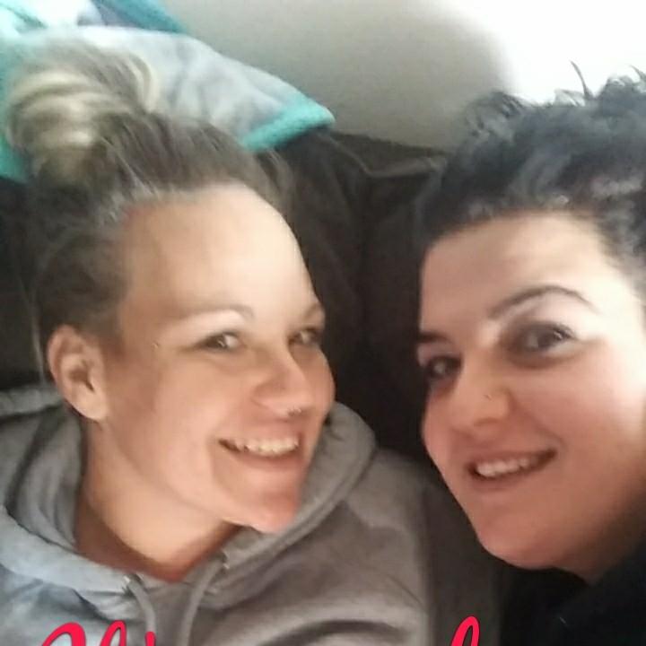 Bridesmaid (maid of honor) and the bride