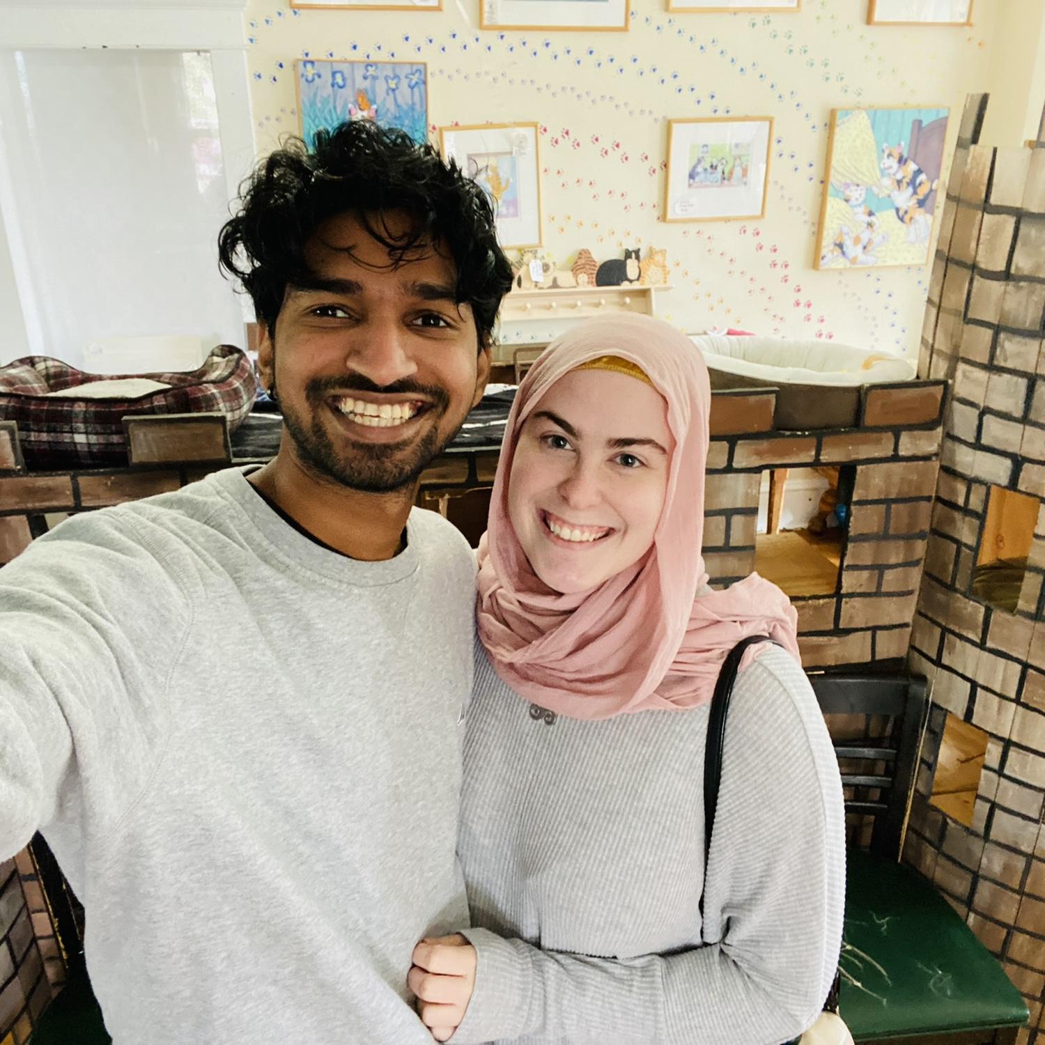 We spent our first anniversary at a cat cafe and resisted the urge to bring home another cat.