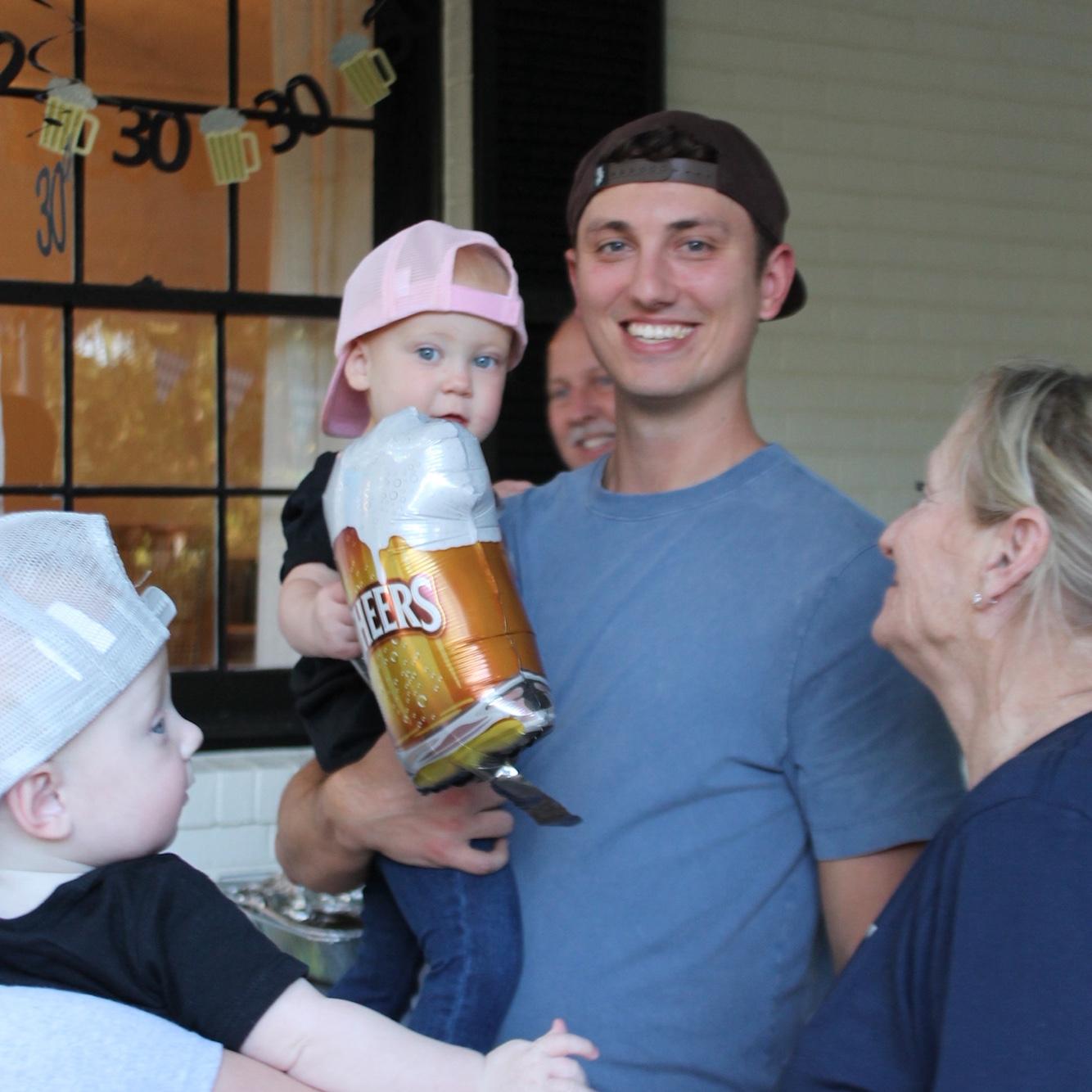 Brad and his niece Nora at his 30th birthday party