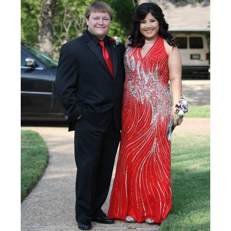 A photo that we took together during our senior prom in 2014.