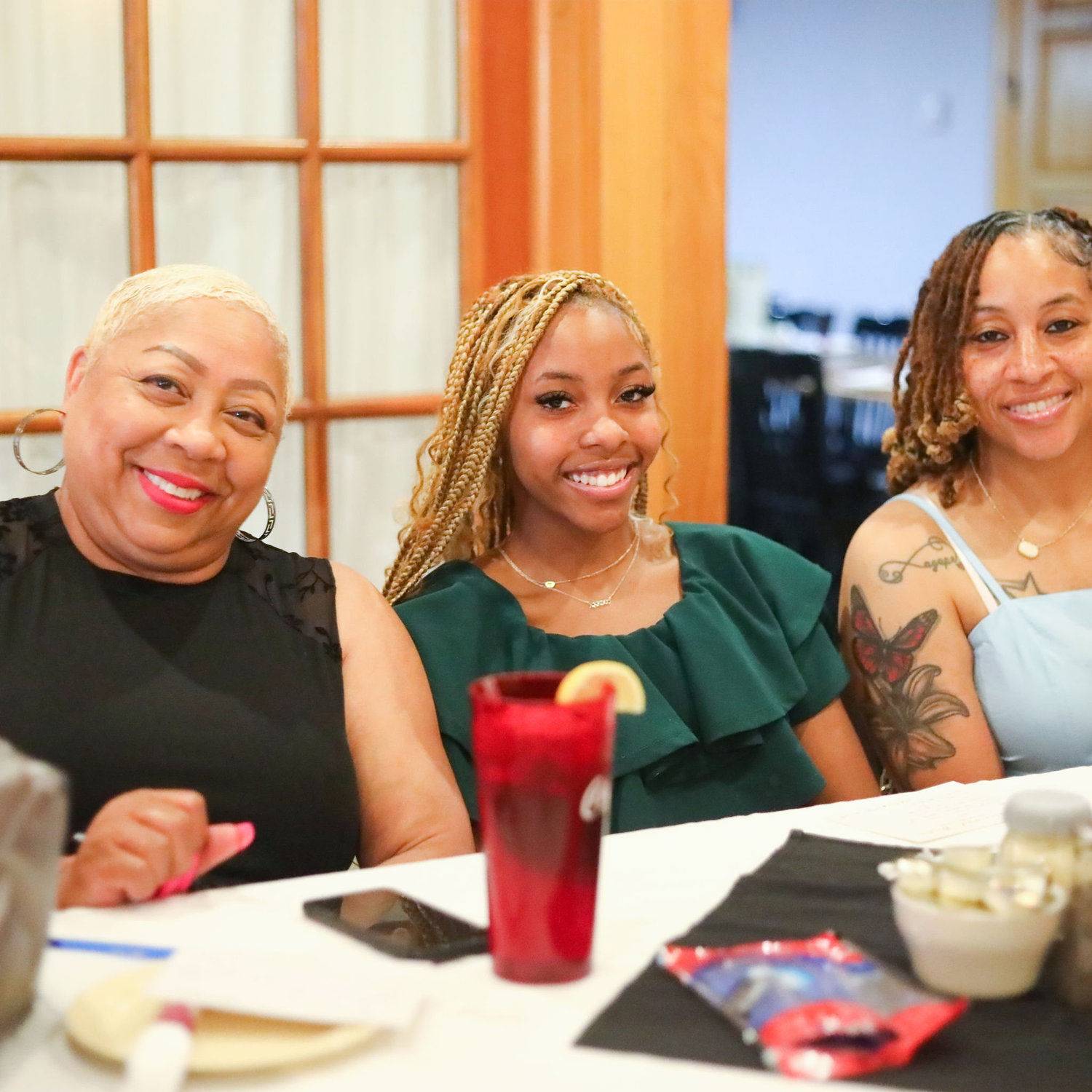 mother, niece, and sister of the groom