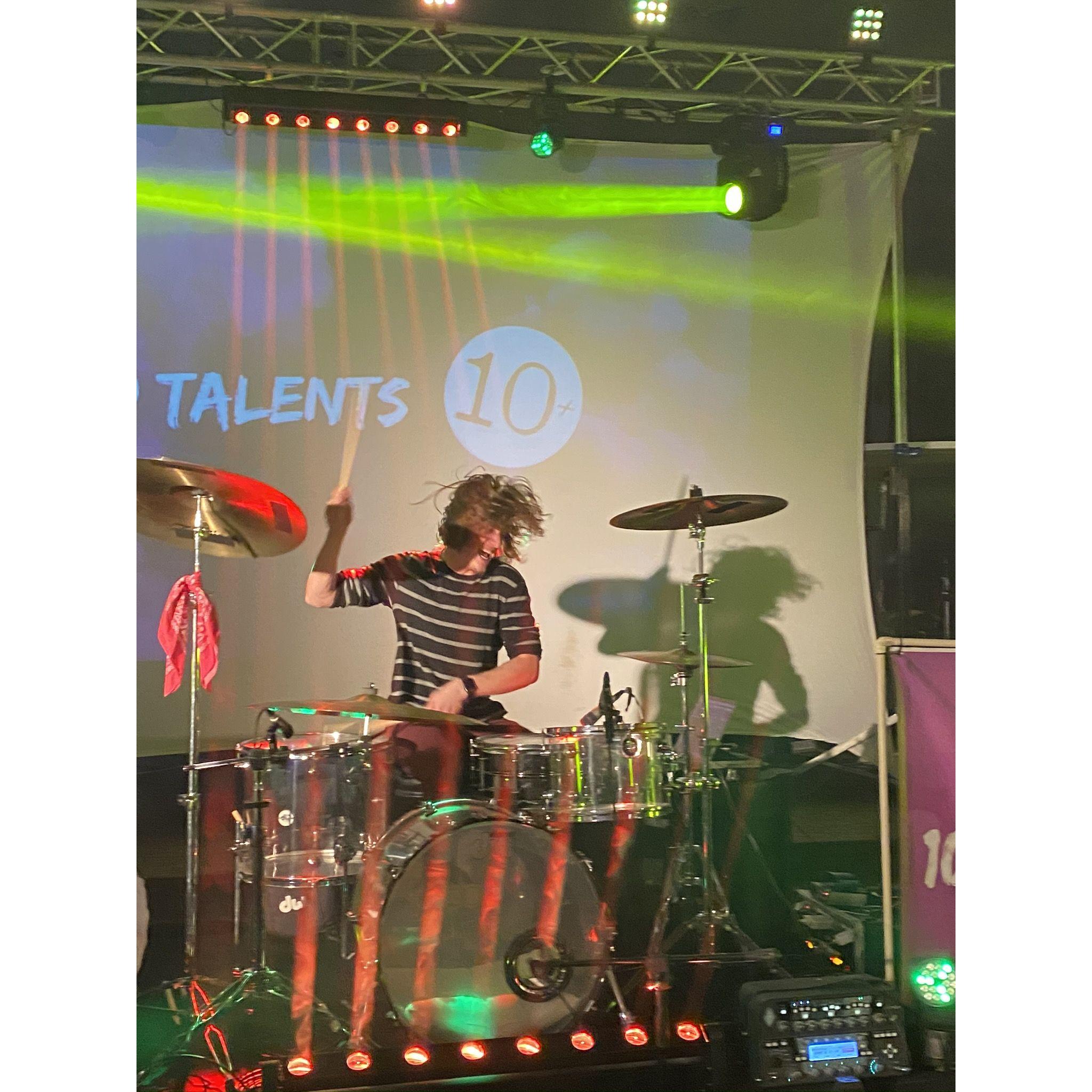 John doing his thing on stage with 10 Talents!