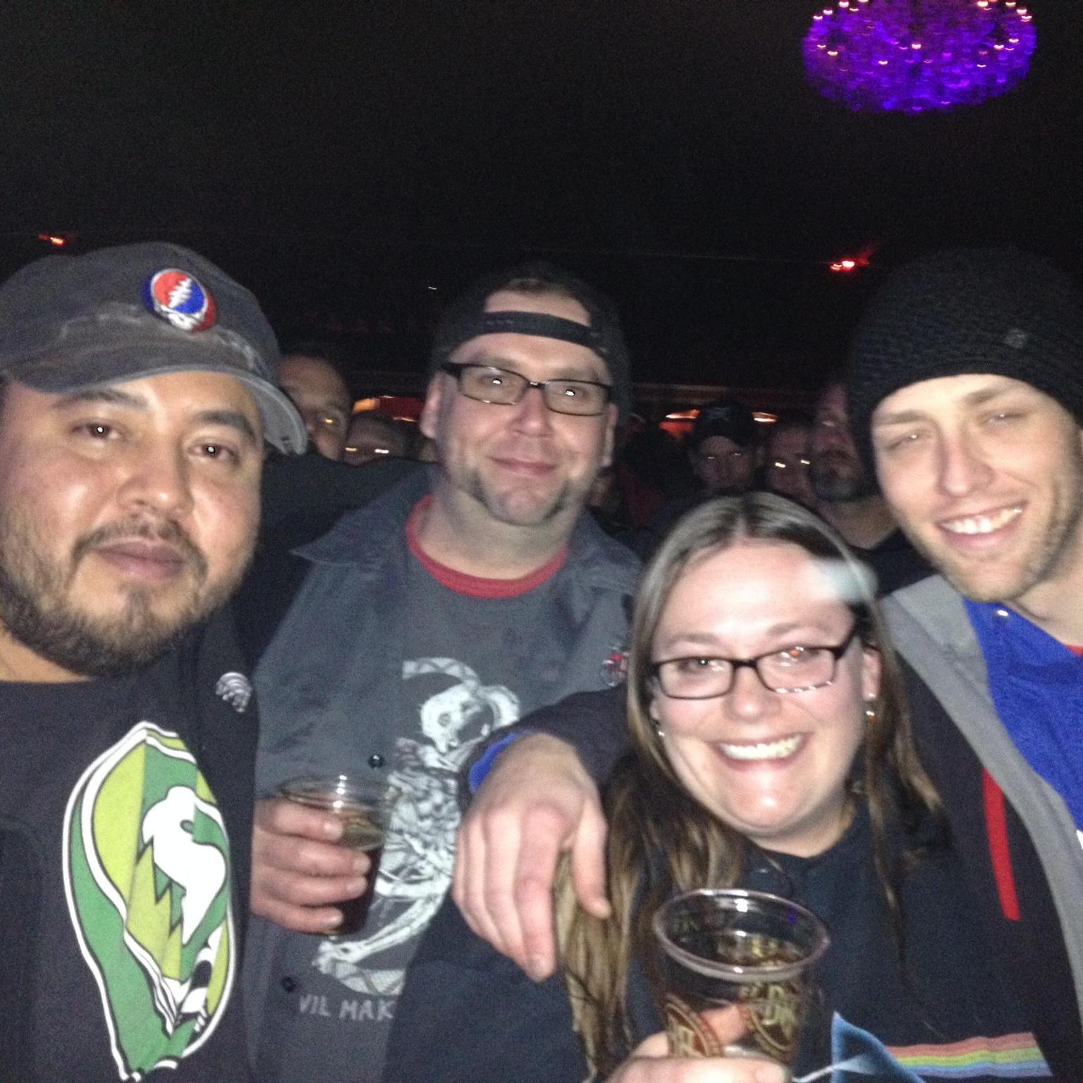 At the concert with Mitch and Chris, part of our wedding party.
