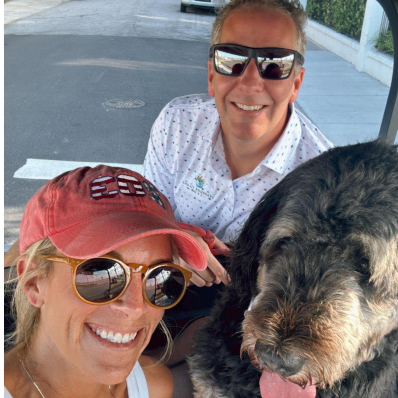 Golf cart cruisin' around town, Rupert refuses to sit anywhere but the front seat, sorry Zack!