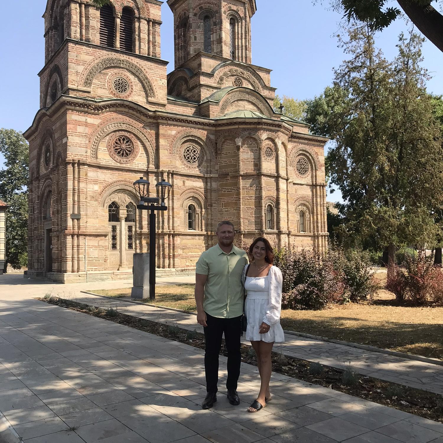 Us right before Jack got baptized into Christian Orthodoxy (in a church from the 14th century in Krusevac, Serbia)