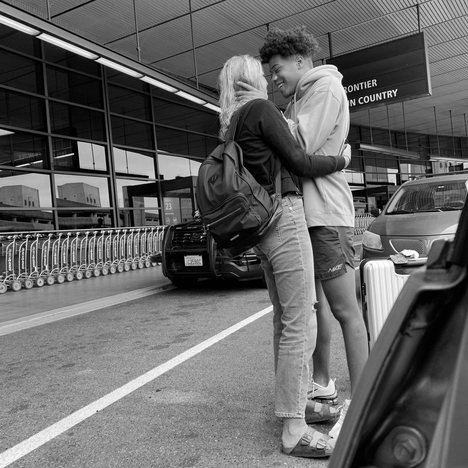Airport goodbyes were always the hardest! We spent our whole first year together, long-distance.