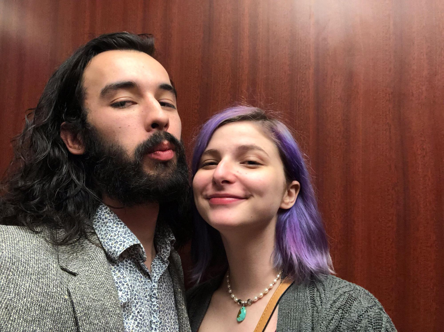 Us getting dressed up to go out on a classic date night while living in their first hilltop apartment.