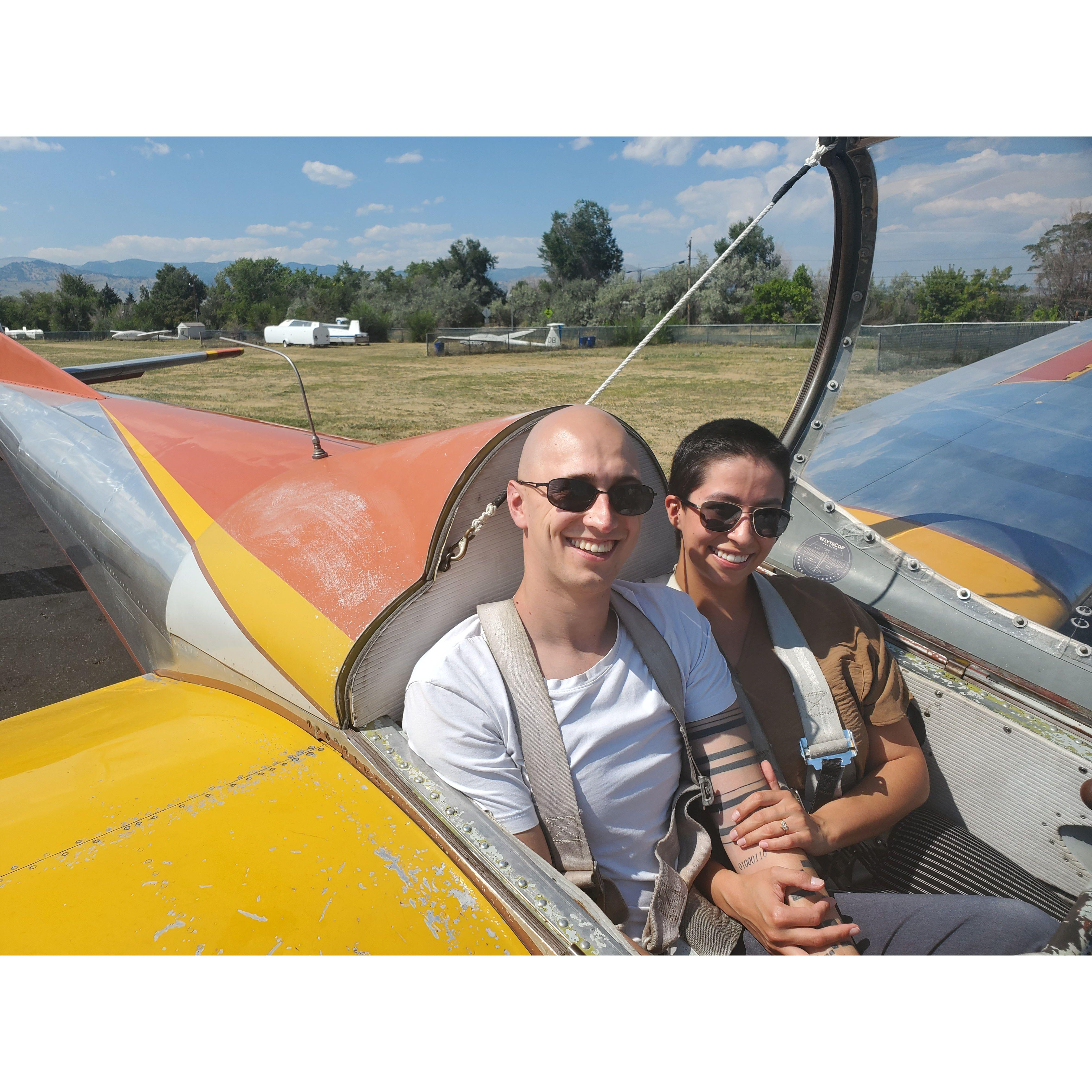 Flying high above the city of Boulder on a glider plane