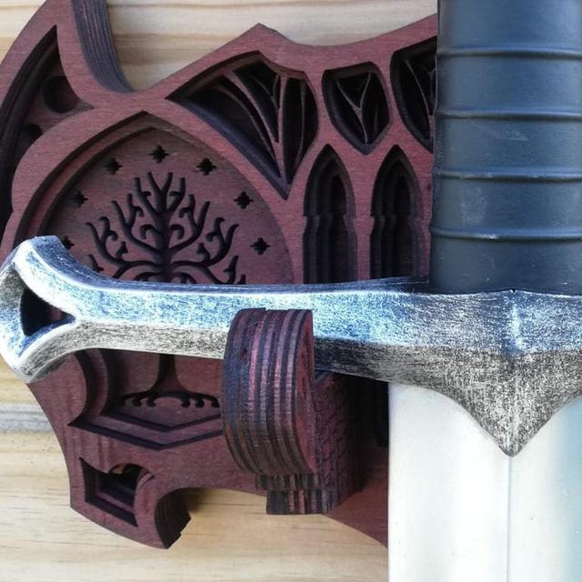 Wooden wall mount for sword based in The...