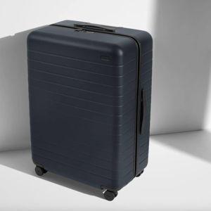 Shop Large & Checked Suitcases in Navy Blue | Away