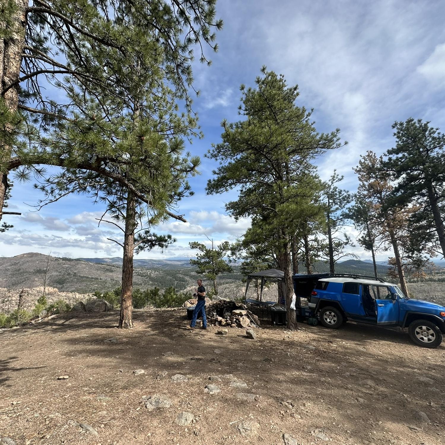 Unbeknownst to Kira, she insisted on finding this exact camping spot, therefore picking out his proposal location