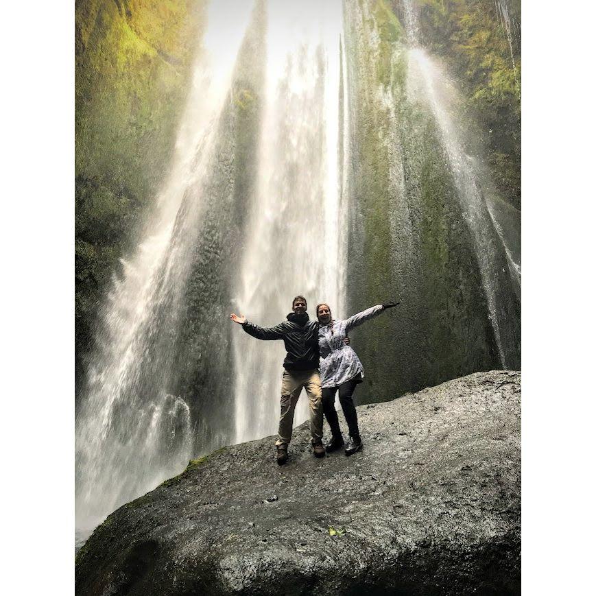 inside a cave checking out a waterfall in Iceland 2018