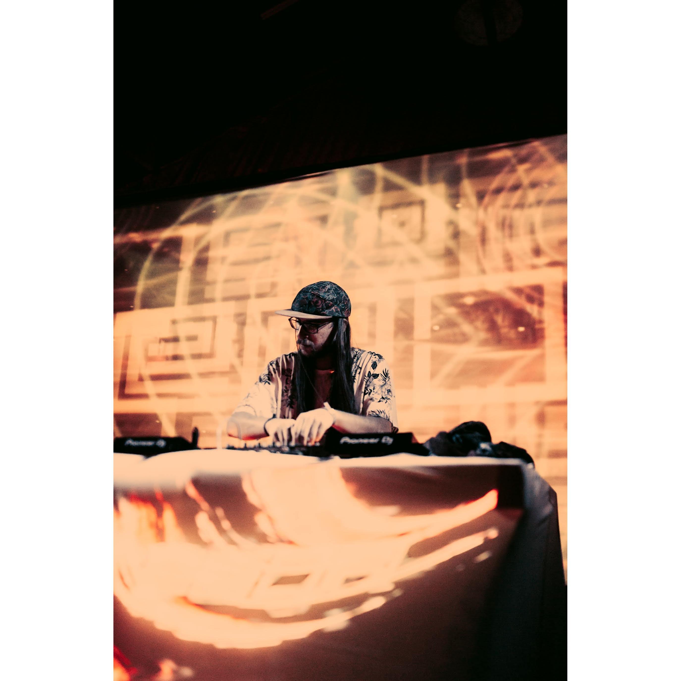 Our friend, Evan Roy, who will be DJ-ing our after party as his artist name, eRoy