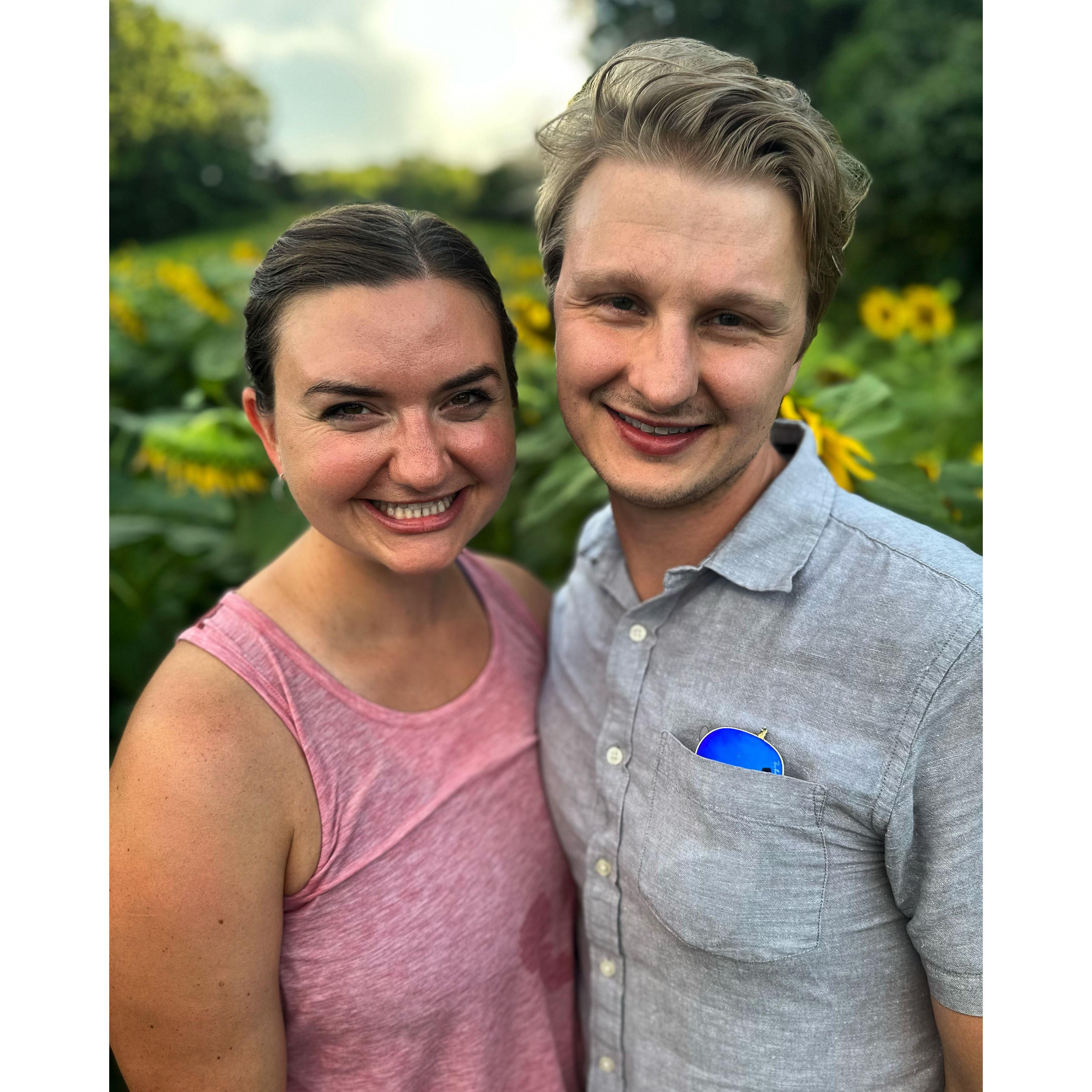 Celebrating our engagement in the sunflowers!