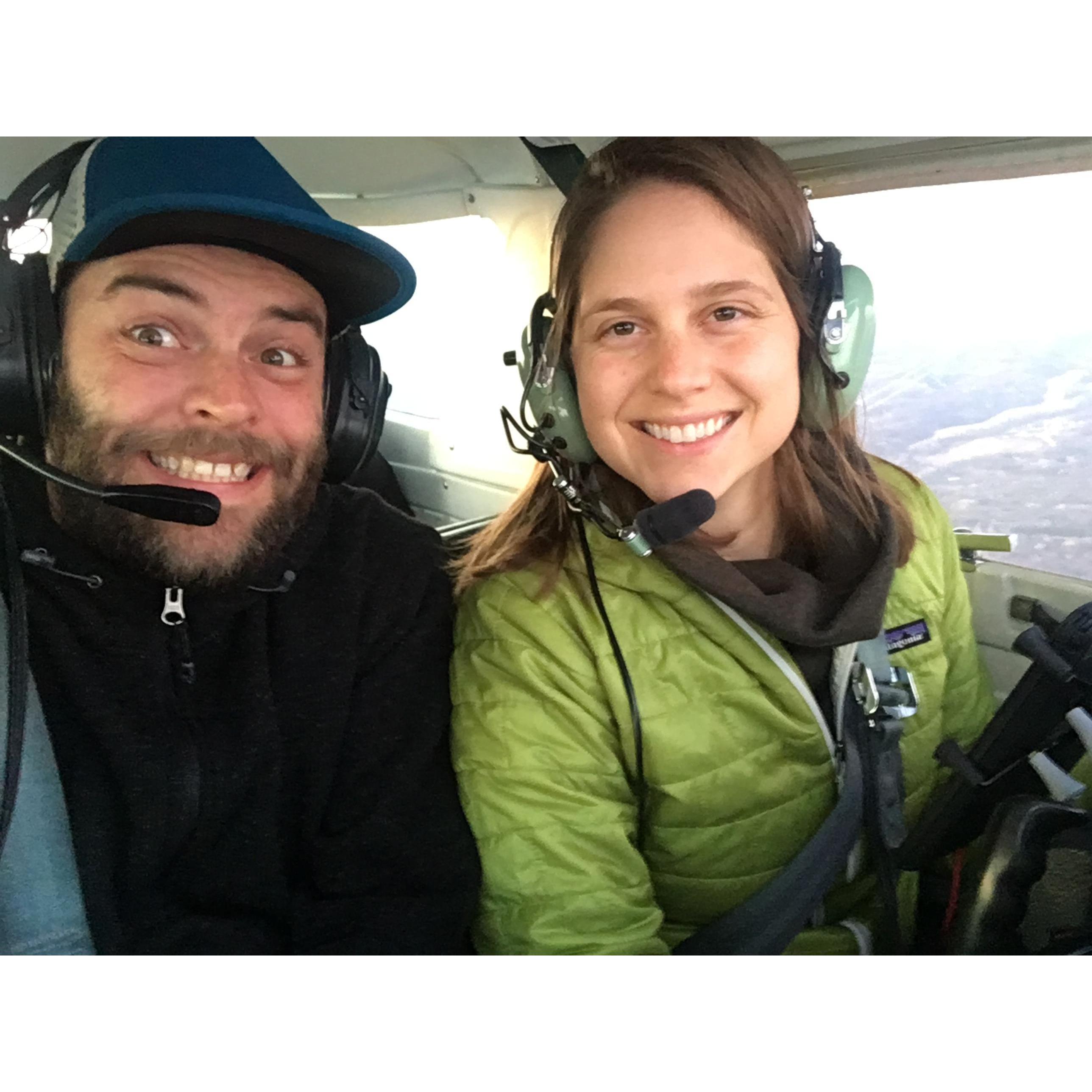 Usually, Shane falls asleep when he flies with Carly. This is a rare moment of alertness.