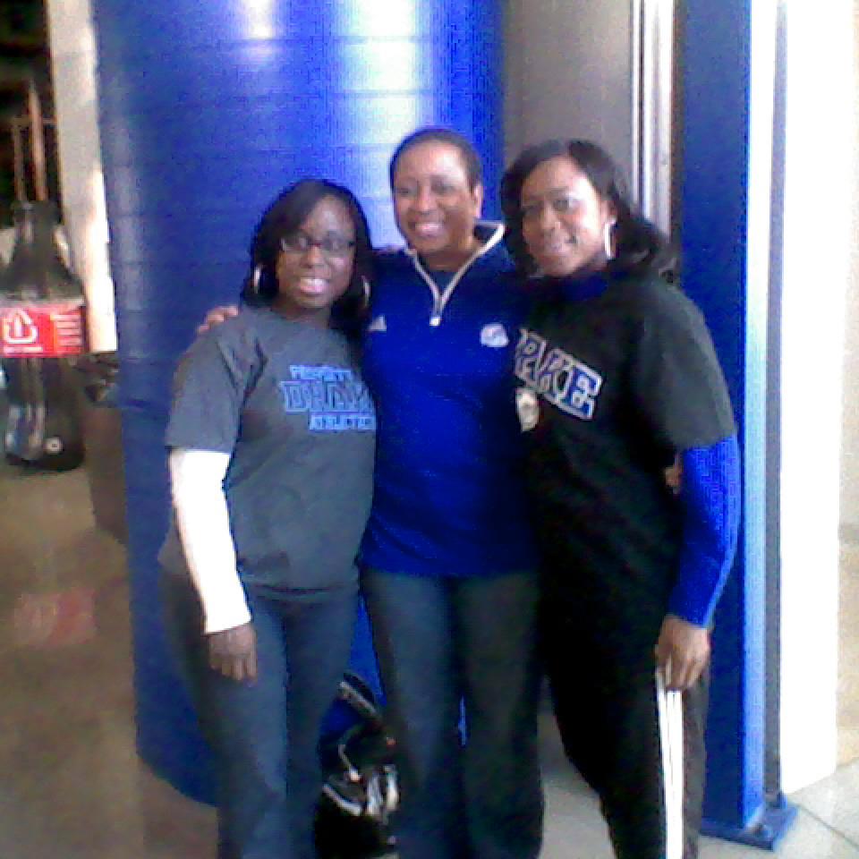 Enjoying a Drake basketball game with “Provost Mama Neese”.