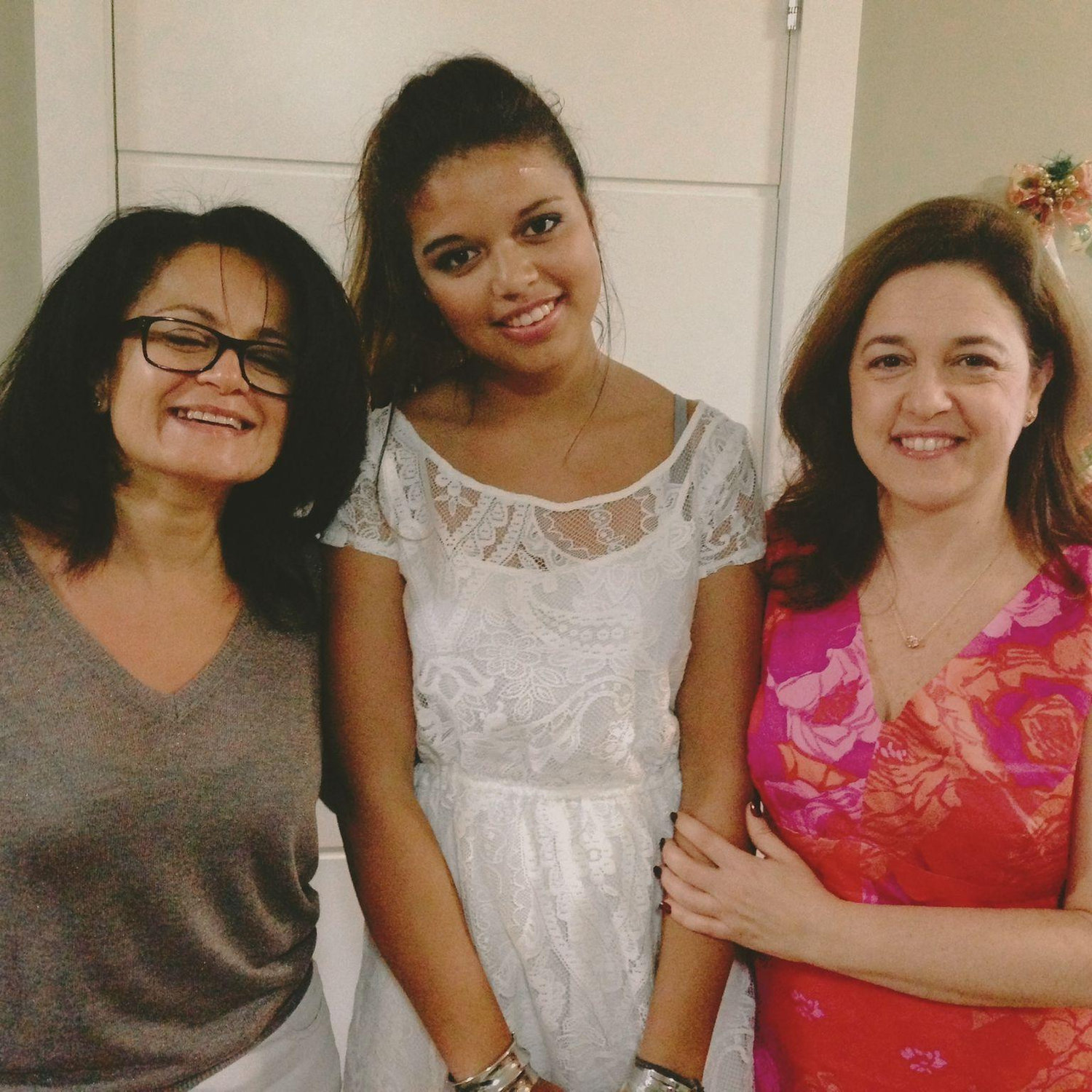 Debbie with her Mother reuniting with her Brazil-based adoption officer, Carla!