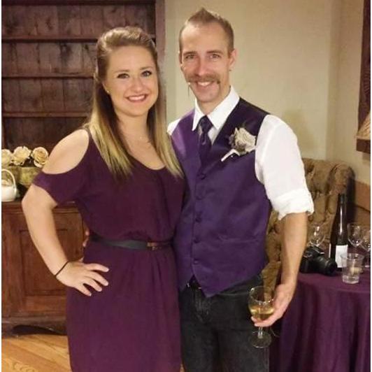 Our first picture together at his mom's wedding