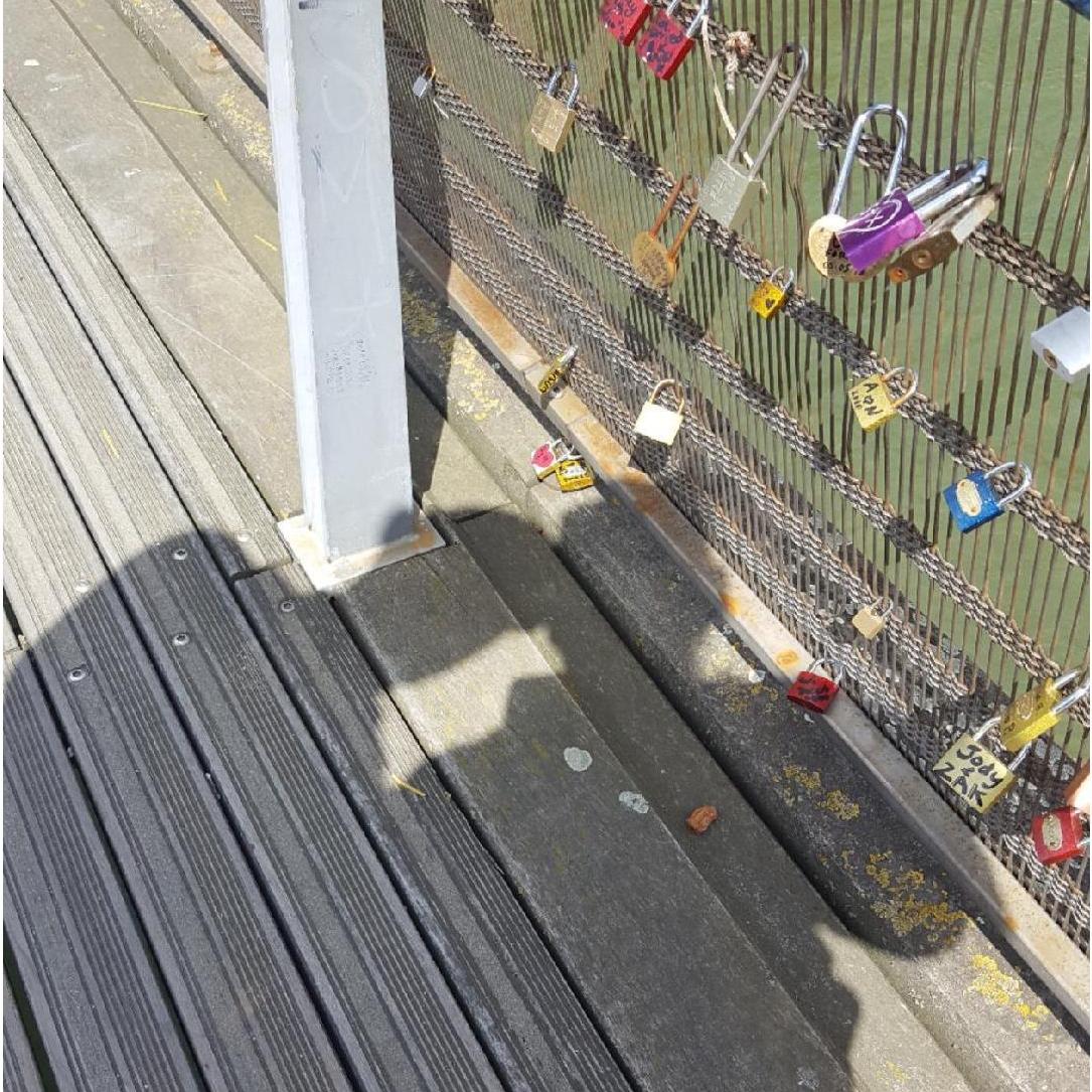 While in Paris, Jeff proposed for a second time... with an engraved lock and placed it on the locks of love bridge