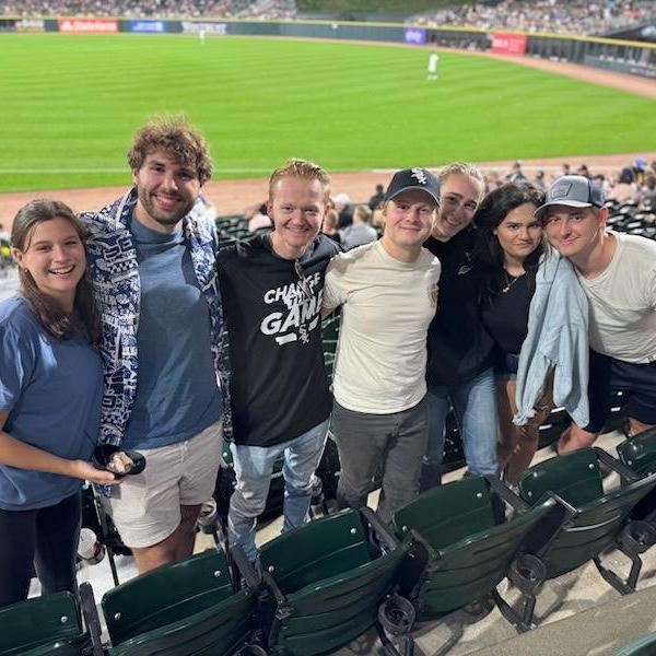 Kristen and Sean with Sean's friends at the White Socks Game. Kaylee (bridesmaid) and Zach (groomsman) are the two on the far left of the photo.