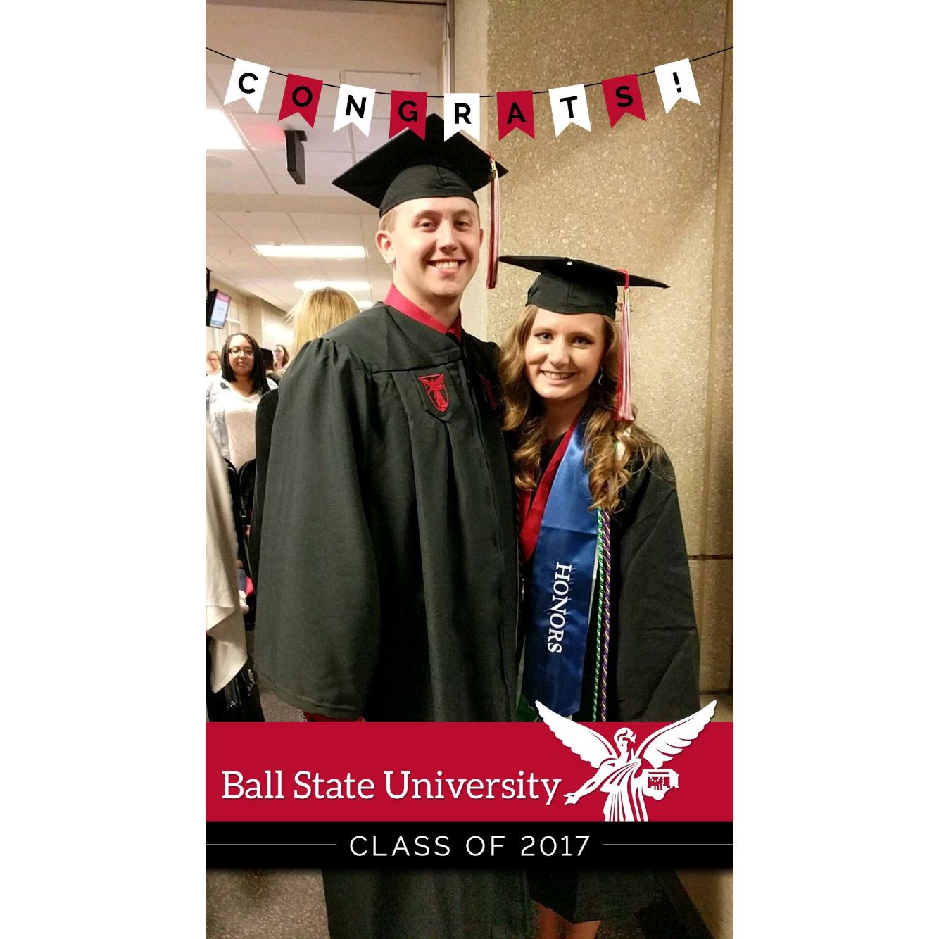 The couple posing for a photo before their graduation from Ball State University. Chirp Chirp!