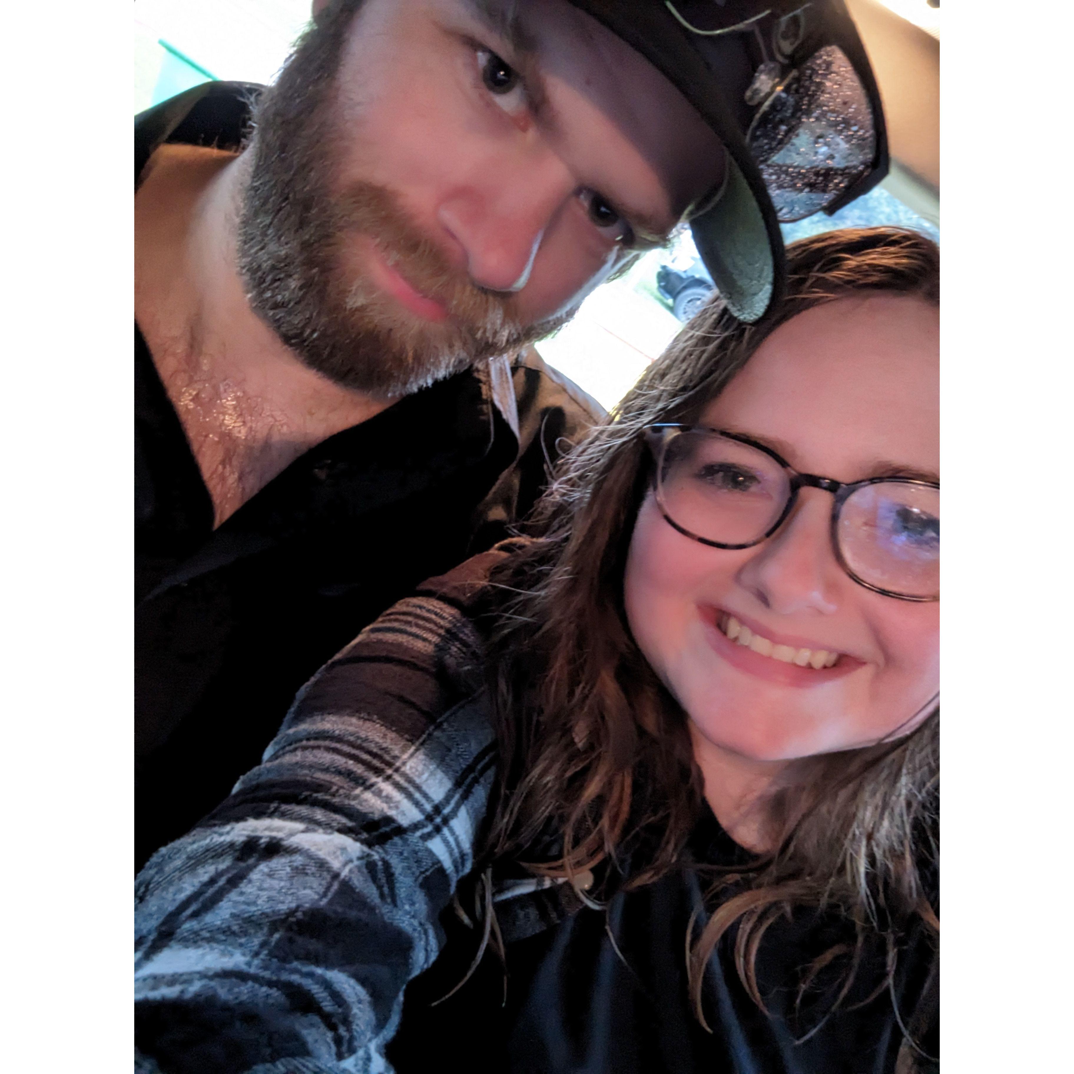 July 2023 - Their first picture together happened after getting poured on during a Demolition Derby!
