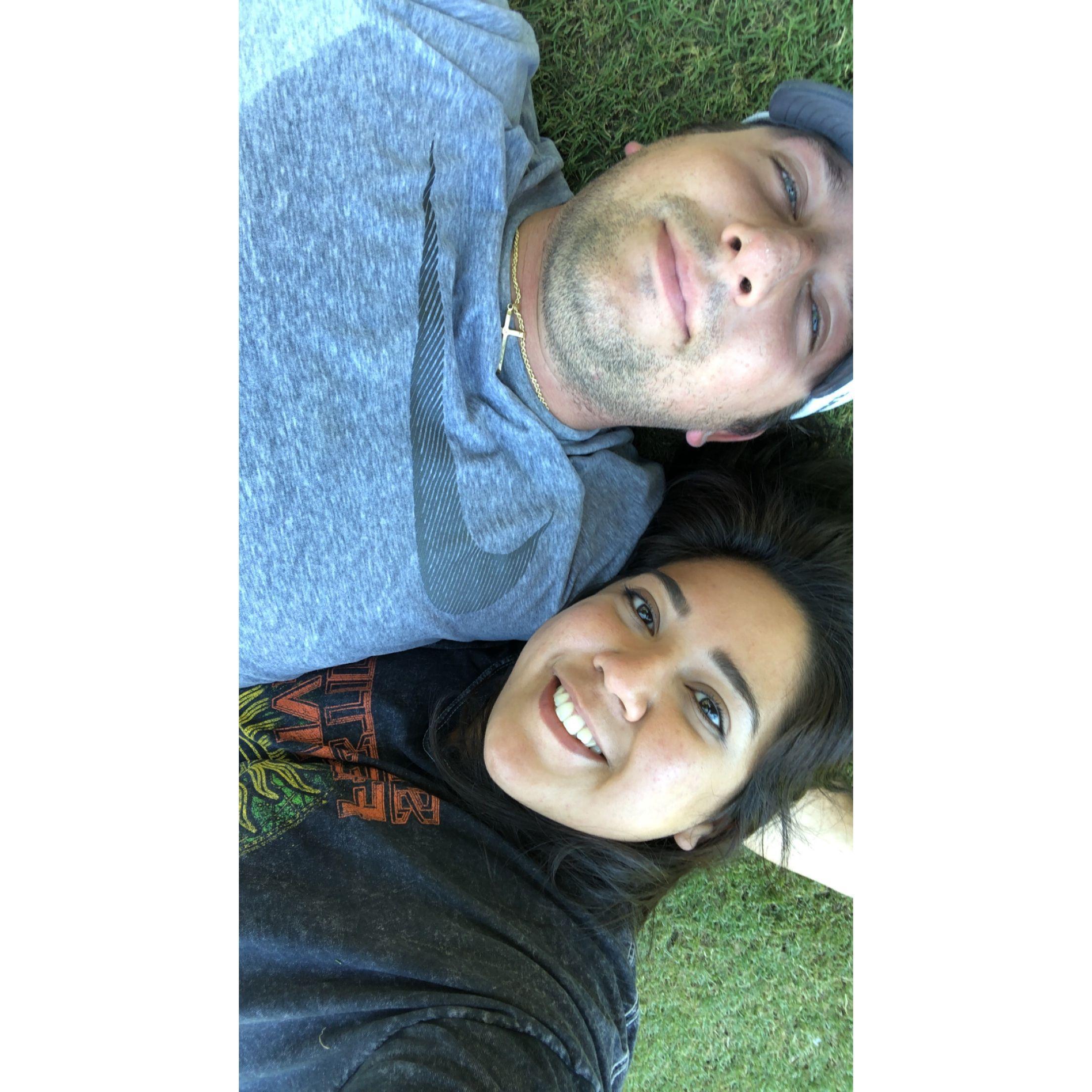 Laying in the grass at Klyde Warren