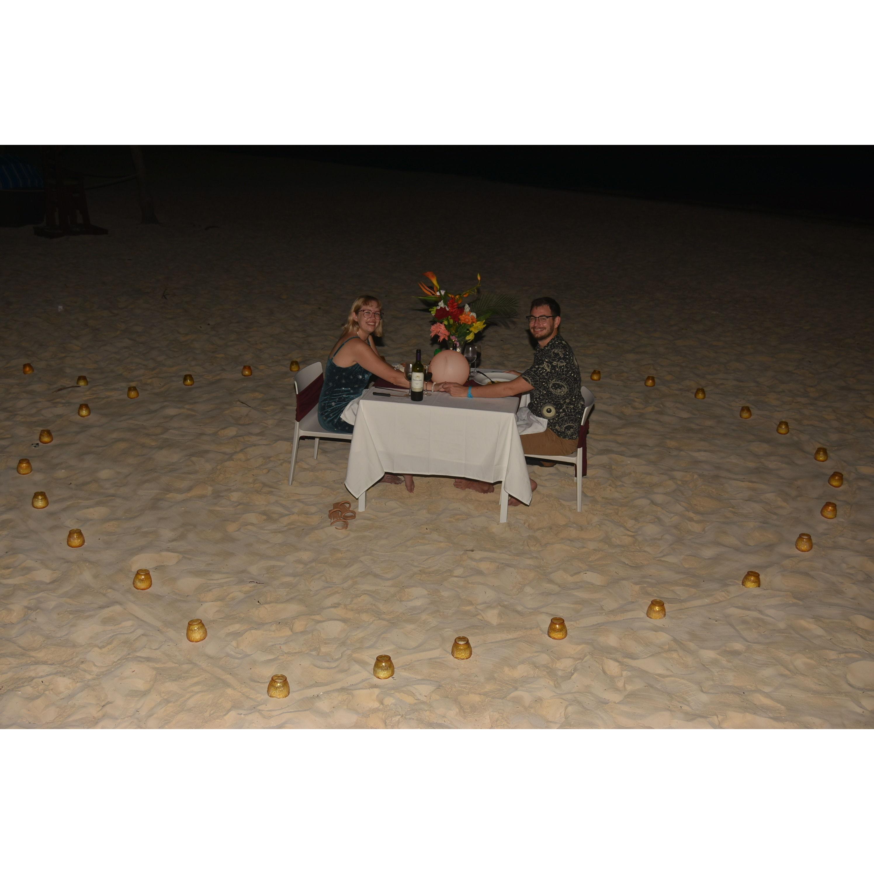 We ate dinner on the beach after Mitchell proposed on a "birthday trip" to the Bahamas.