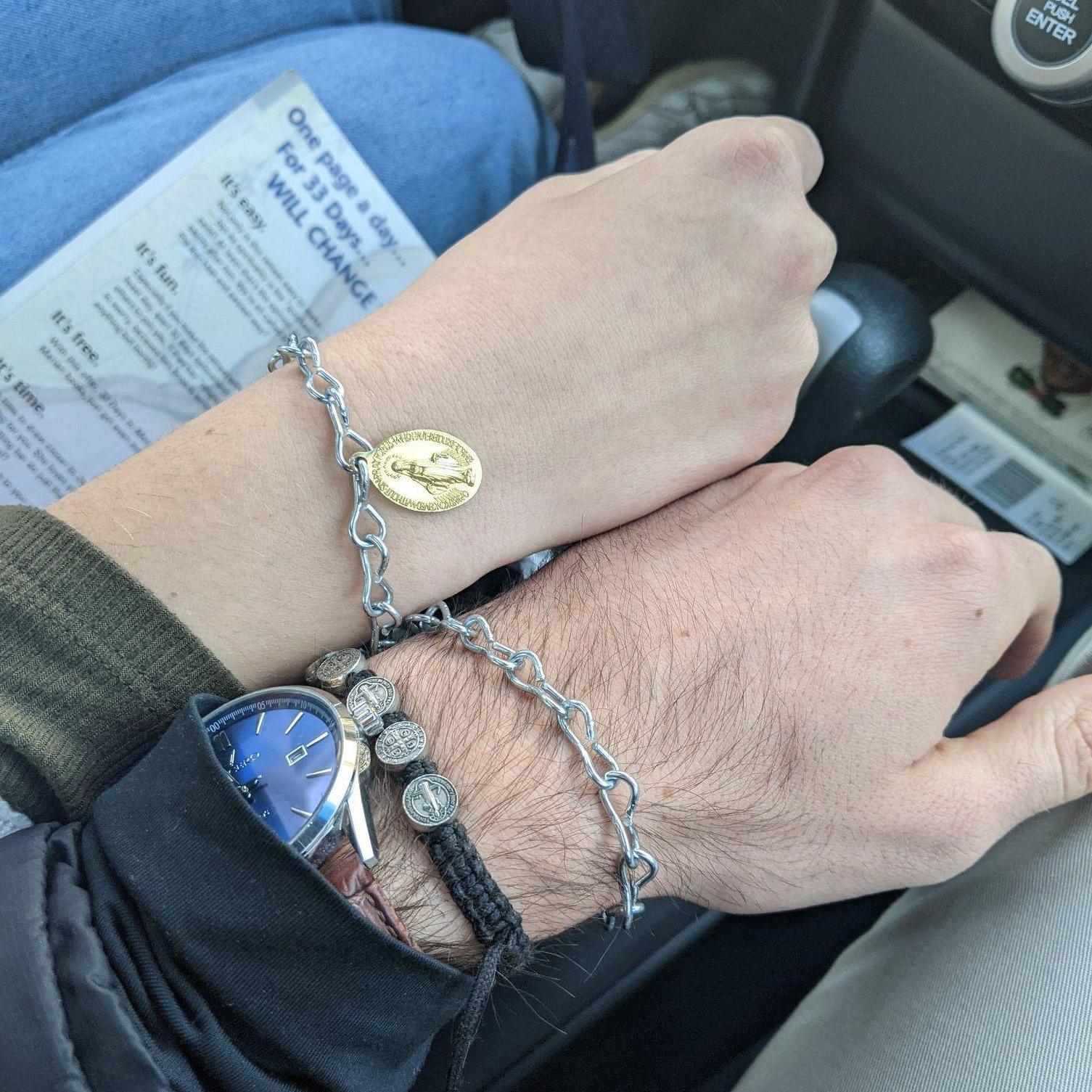 After we made it official, we also finished our Marian consecration! Symbolized with these chains, which we still wear now!