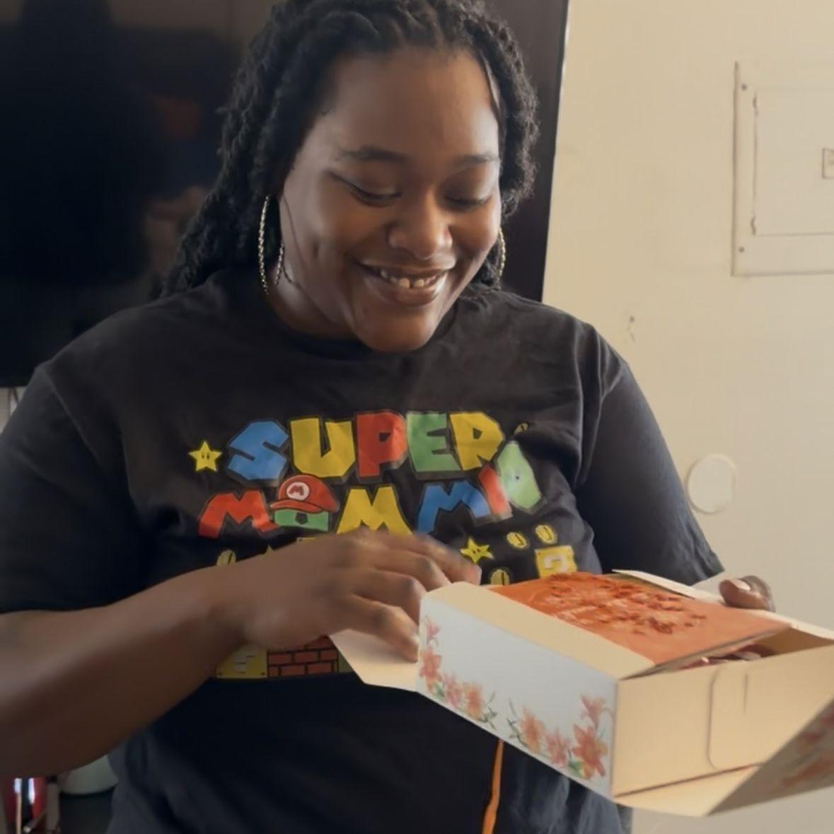 Deedi accepting her bridesmaid box!