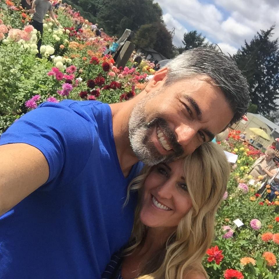 Love amongst a field of dahlias