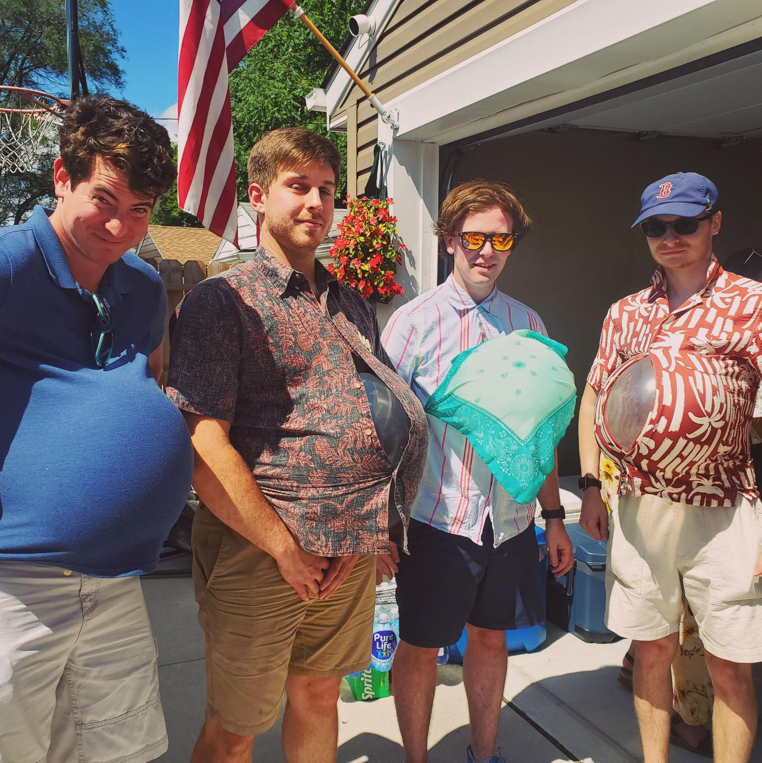 Here's John, David, Chase, and James with baby bumps at Orion and Hannah's Baby Shower in Michigan.