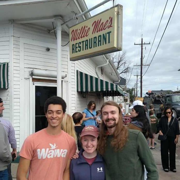 Ellis, Claire, and Joe waiting to eat the best fried chicken in the world