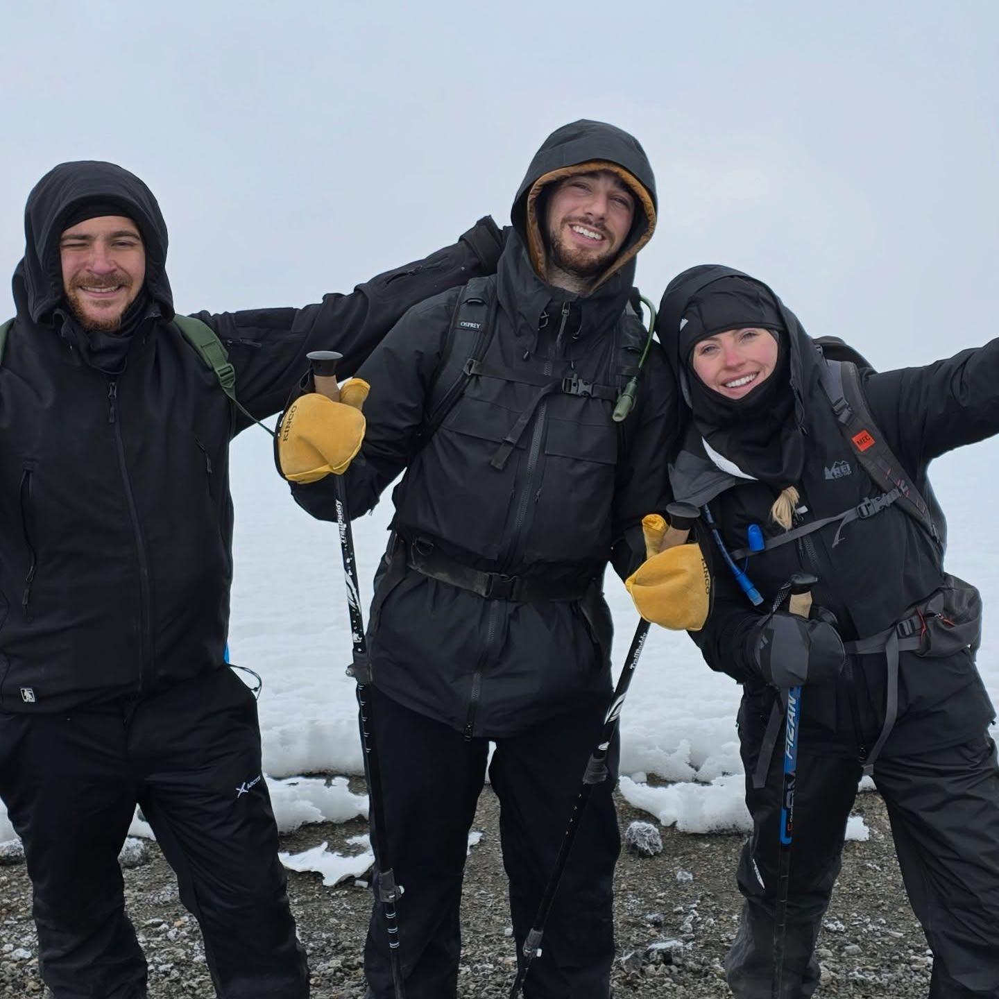 Climbing Mt. Kilimanjaro with their friend Jesse!