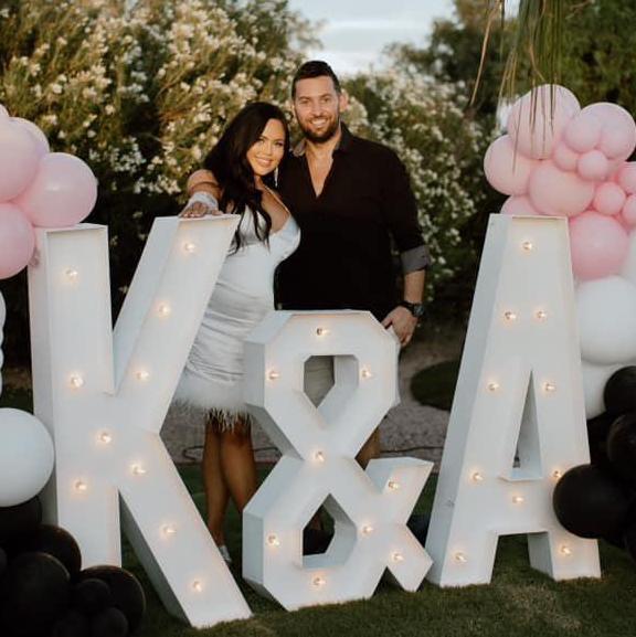 KANDY at their engagement party.