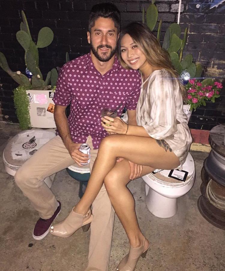 August 2017 - Our very first picture taken at a bar called Double Wide (yes, those are toilets we are sitting on haha)