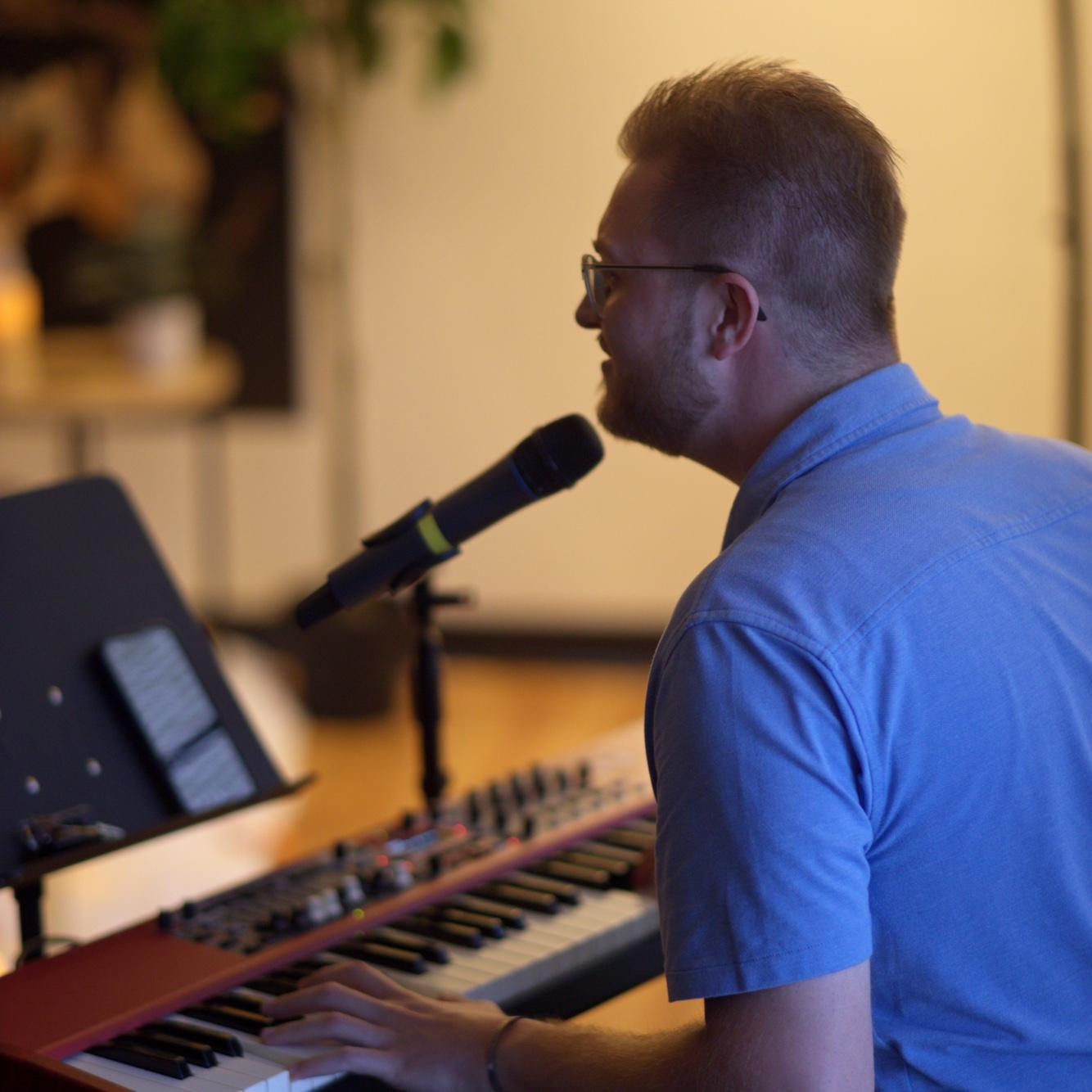 Matt singing to Leah an original song he worked hard to produce!