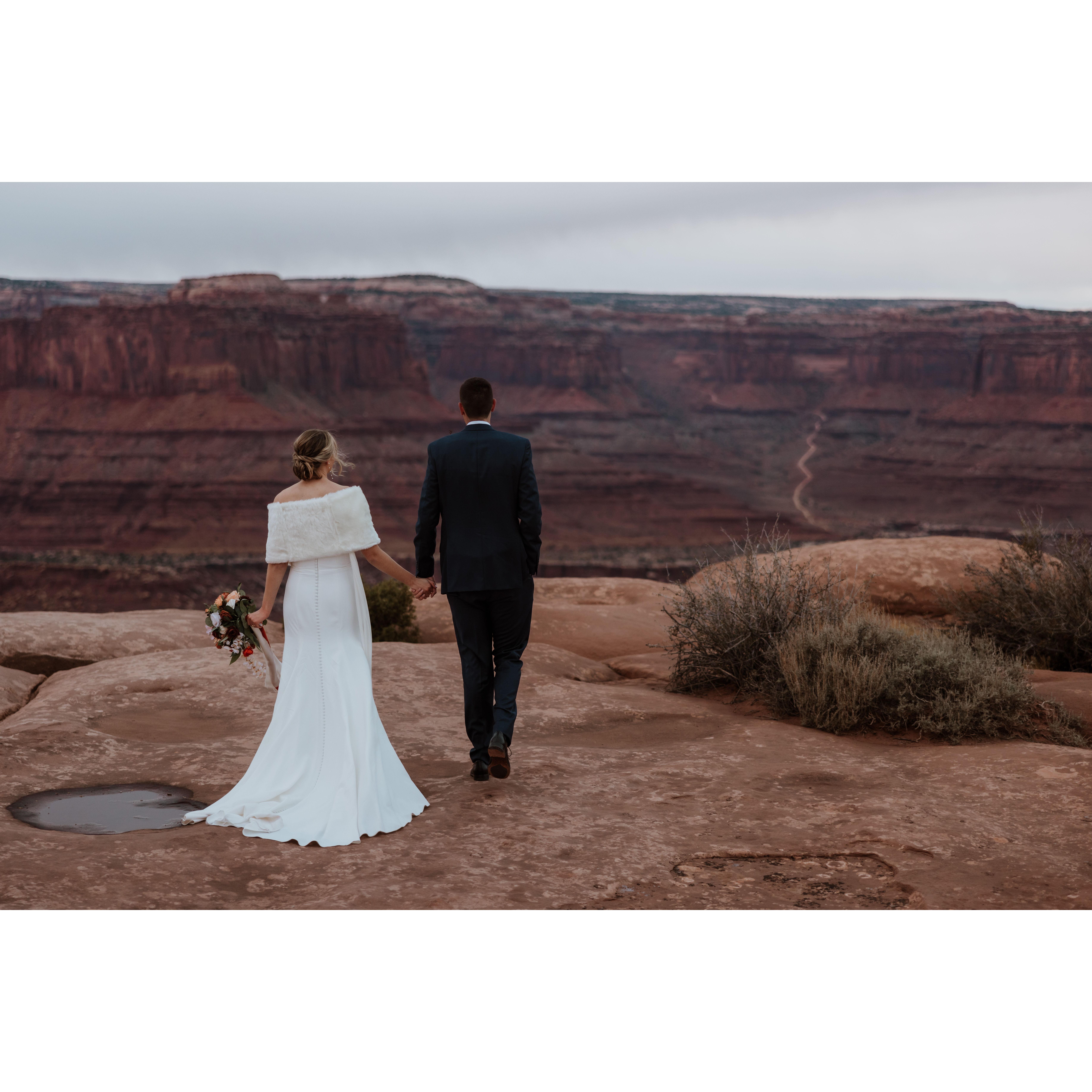 On our first trip to Moab in 2021, we drove the dirt road in this photo (Shafer Trail) in our rental Jeep Grand Cherokee!