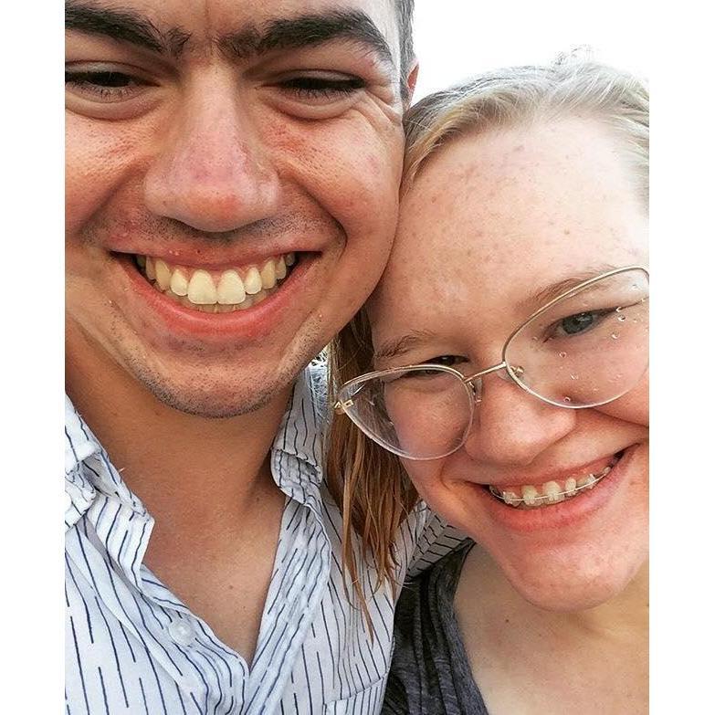 Neither of us looks good in this photo, but it was taken after walking miles barefoot in the rain in Philly during our first weekend away together.