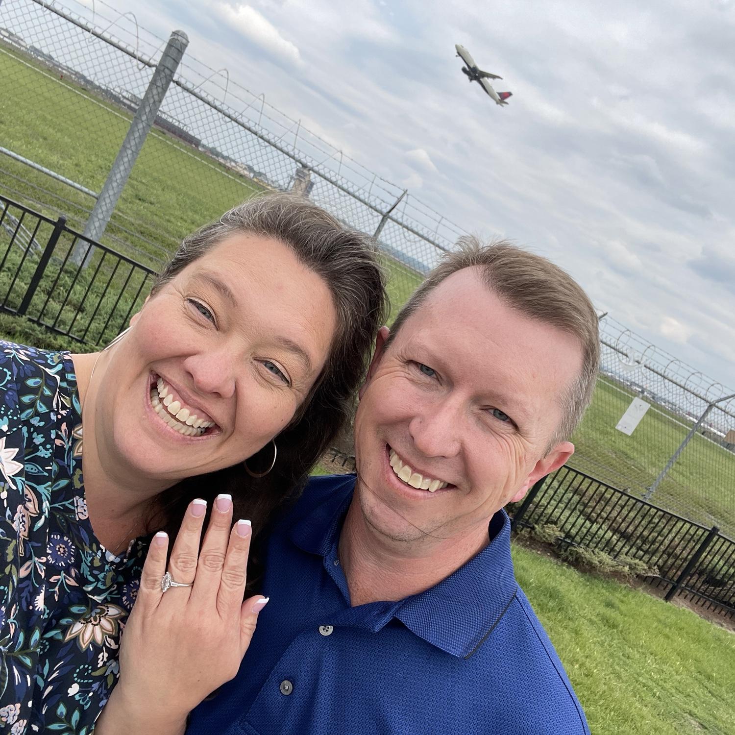 After taking a picture, I realized with the barb wire in the background people might think we are at a prison. We waited to time it correct to make sure we captured a plane in the background!