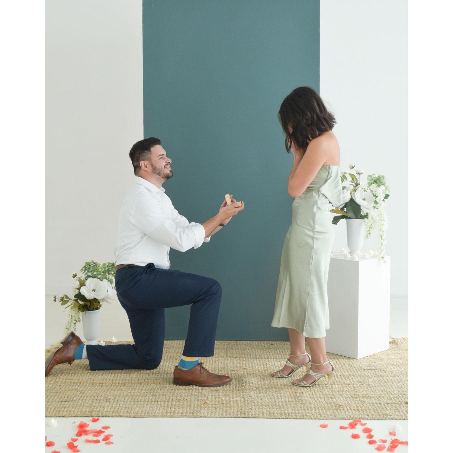 We got engaged on July 23, 2023! Alex and his family tricked me to go to a "family photoshoot", but in reality it was him waiting to propose!