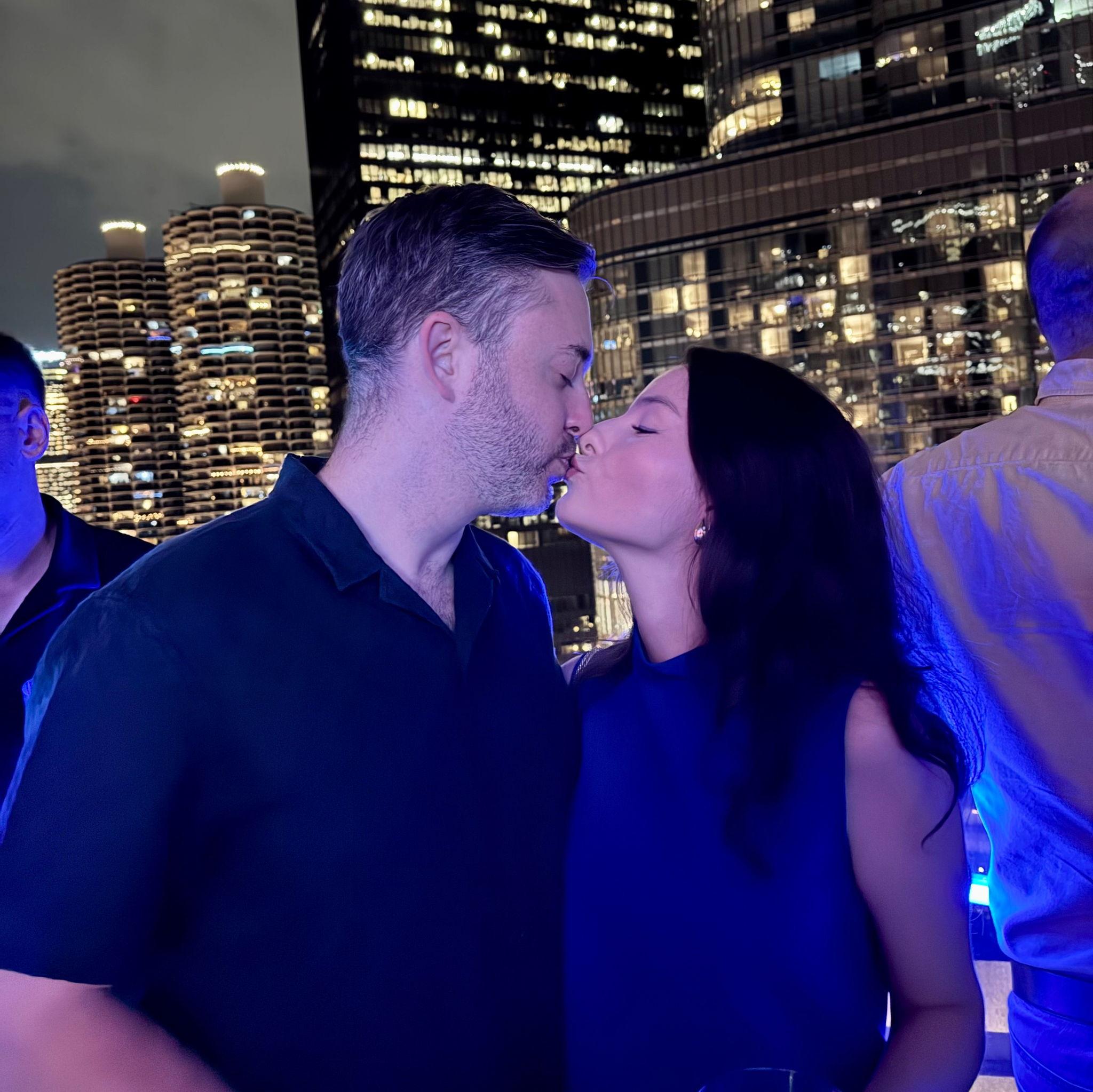 Sharing a kiss to remember.