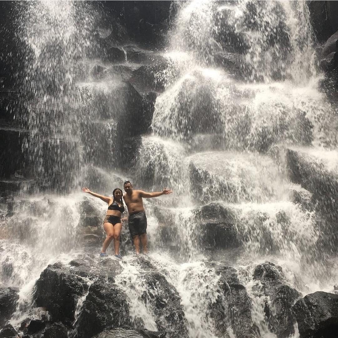 Enjoying one of many waterfalls in Bali, illness free!